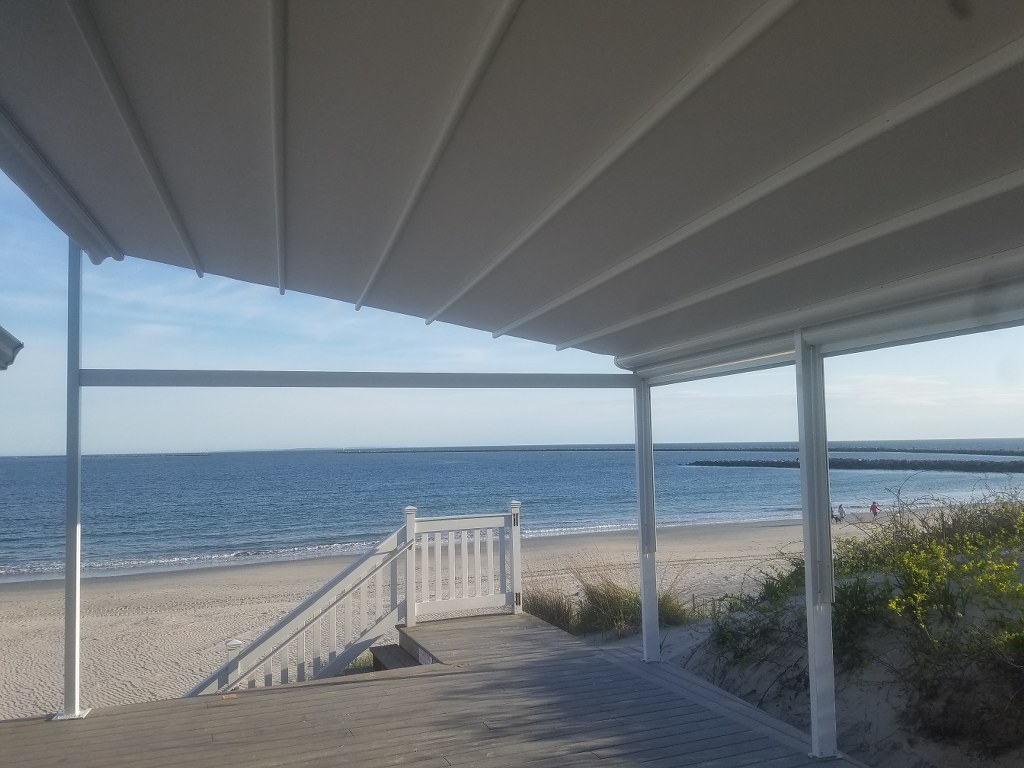 Custom-Palladia-with-Clear-Vinyl-Screens-at-Galilee-Beach-Club-by-New-Haven-Awning-(1).jpg